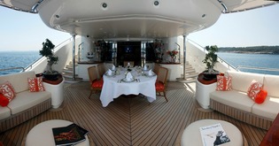 Upper aft deck, dining and cocktail tables